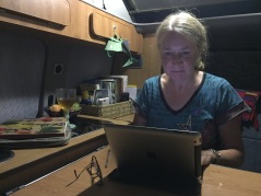 Working on iPad in campervan